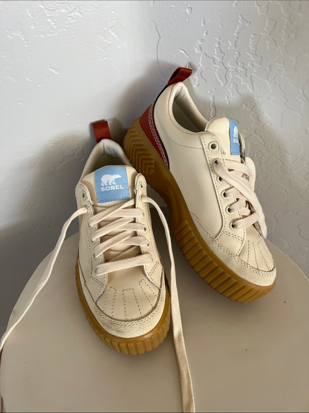 Sorel Womens Cream Leather Sneakers with Gum Sole and Red Heel Tab